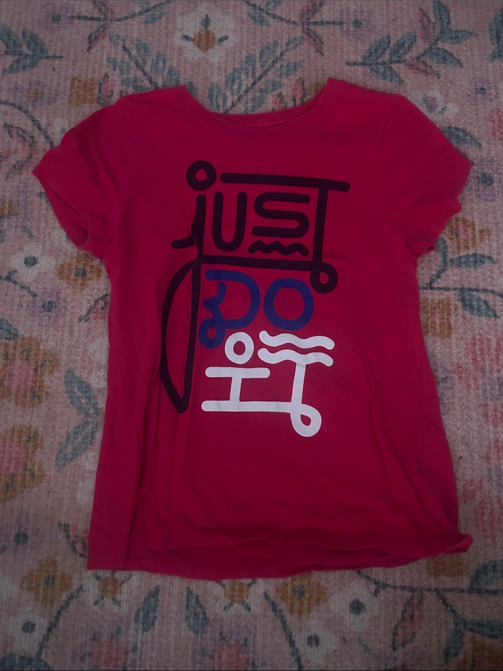 Nike Pink Short Sleeve Tee with Graphic 'Just Do It' Design